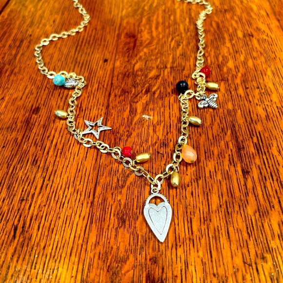 Chico's Jewelry - Chico’s 34 in charm necklace tag still attached. Charms include heart, star, etc